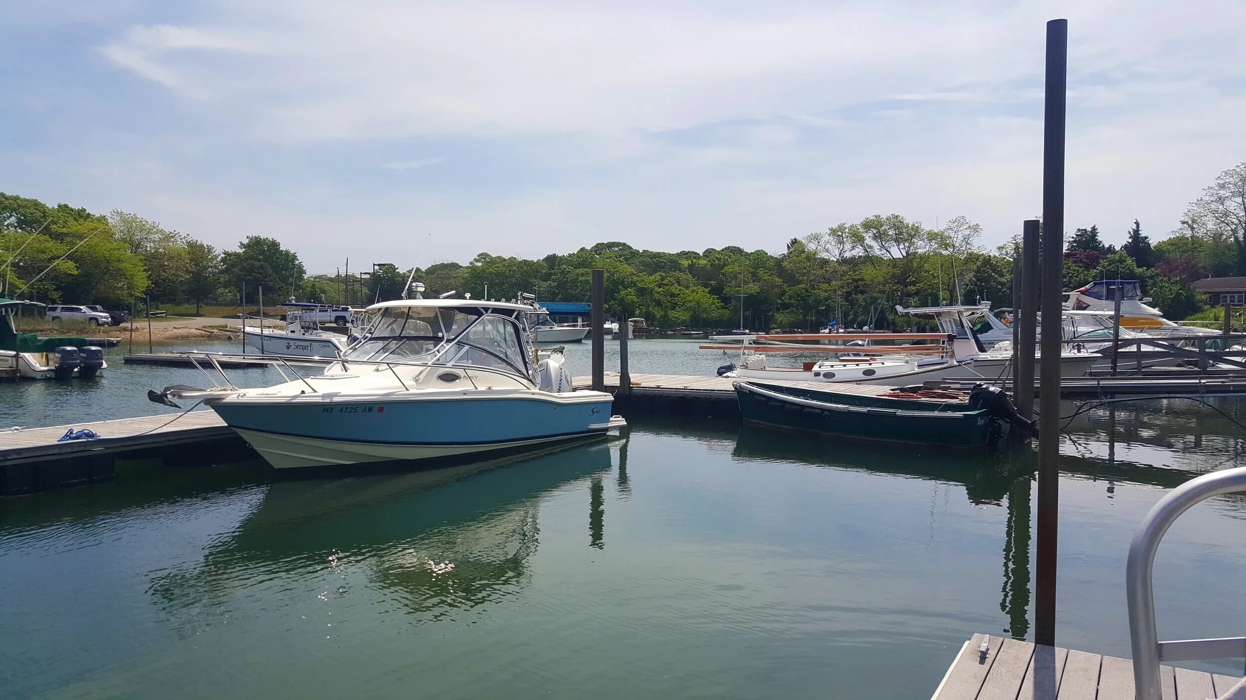 Slips at Scallop Bay Marina on a calm morning